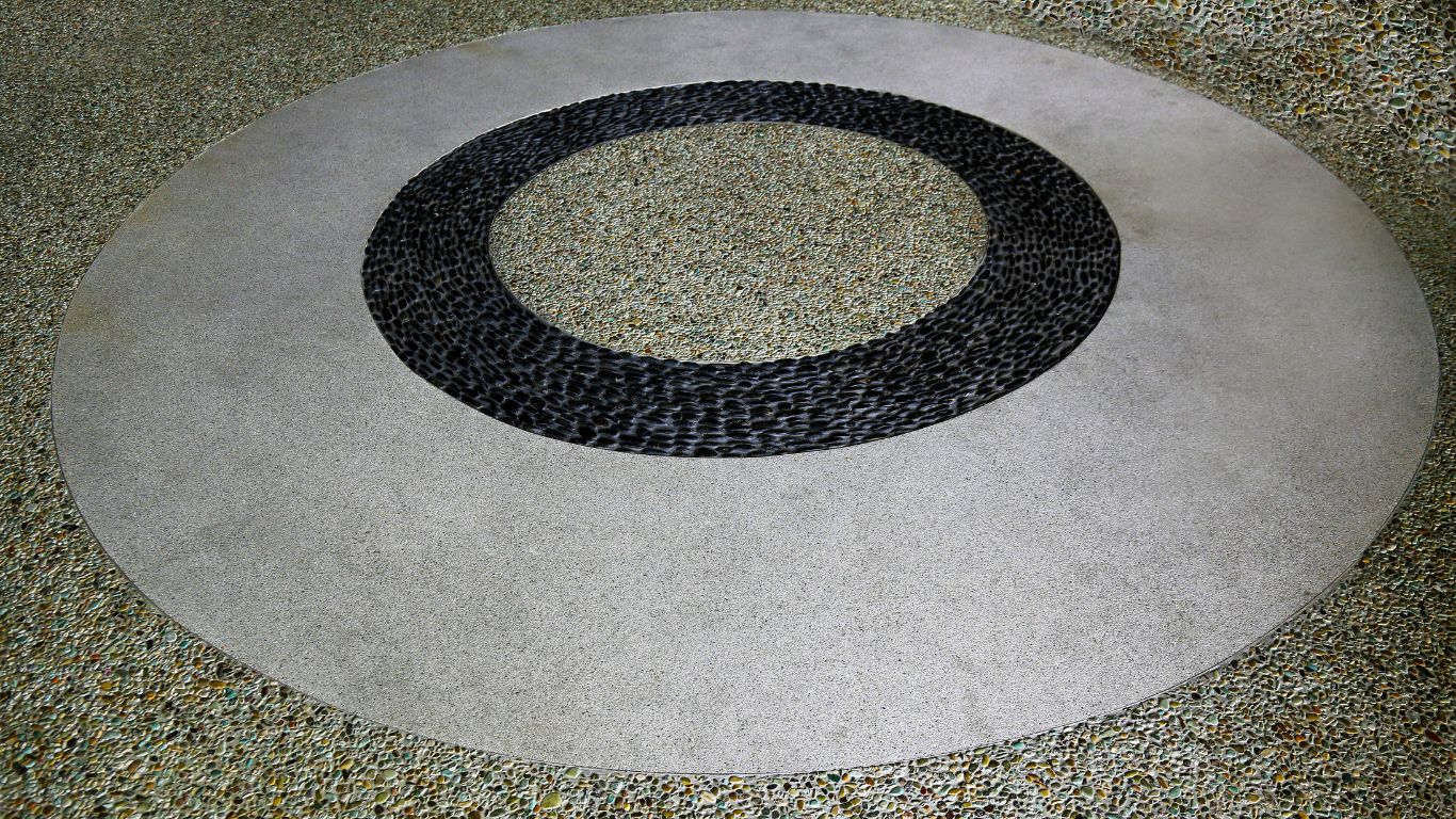 Polished circular design after fort myers terrazzo floor restoration.
